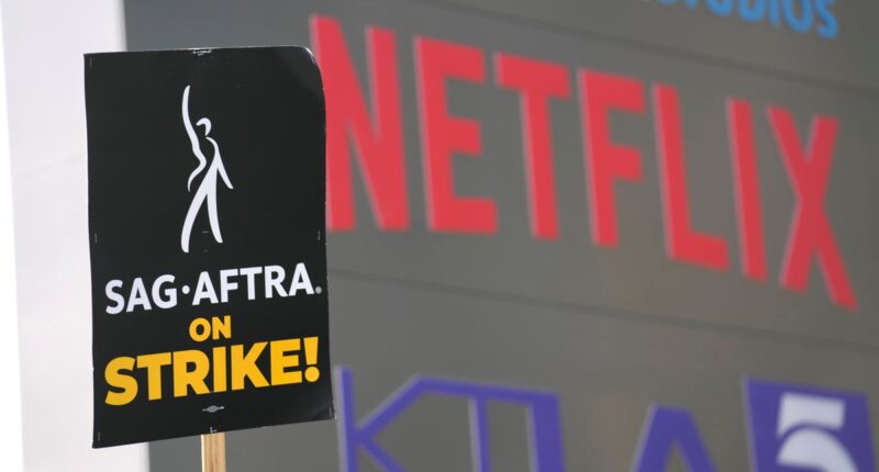 Screenwriters overwhelmingly approve a 4-year contract with Hollywood studios