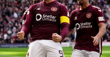 Lawrence Shankland celebrates after scoring Hearts' second goal from the penalty spot