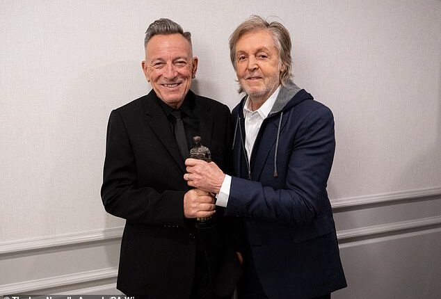 Bruce Springsteen appeared in high spirits on Thursday evening as he was presented the Academy Fellowship Award by pal Sir Paul McCartney at the star-studded Ivor Novello Awards