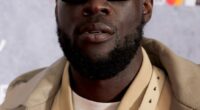 Stormzy hid behind sunglasses as he attended the star-studded 2025 BRIT Awards at London¿s O2 Arena on Saturday