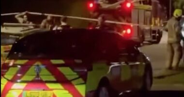 Video footage from the scene shows police and fire crews set up behind a cordon