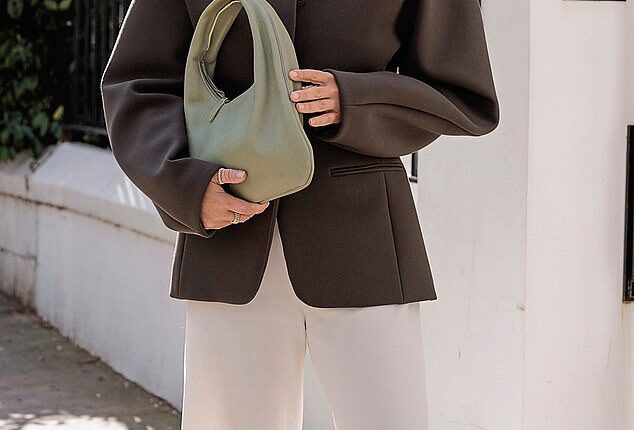 Jacket, Jacquemus. Trousers and bag, The Row. Sunglasses YSL. Shoes, Chanel