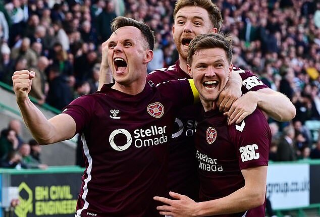 Lawrence Shankland celebrates with Blair Spittal after Hearts' late winner at Easter Road