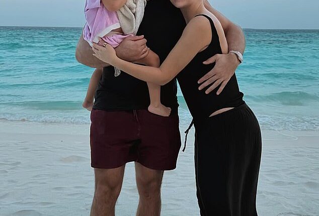 Reality star Molly-Mae Hague and boxer Tommy Fury with their daughter Bambi on holiday