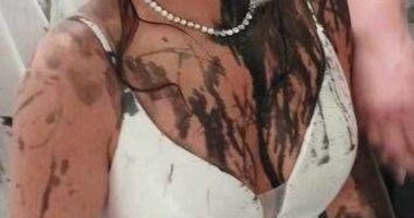 Gemma Monk, 35, on her wedding day after having black paint thrown on her