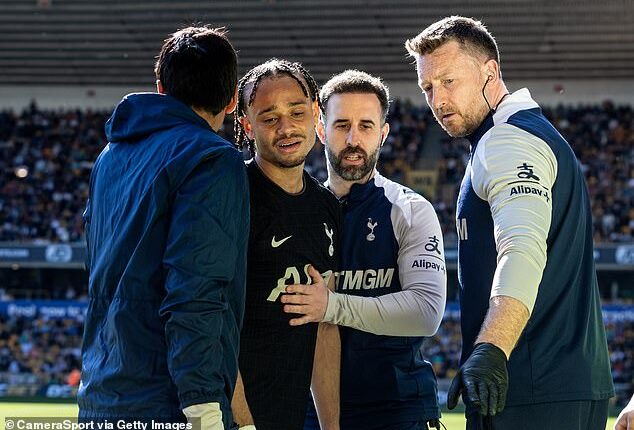 Many Spurs fans are angry with their medical staff over their treatment of Xavi Simons (left)