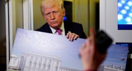 President Donald Trump shows off the latest plans for the White House ballroom during an Air Force One flight on Sunday night. Those plans were approved by the National Capital Planning Commission on Thursday, with only one no vote