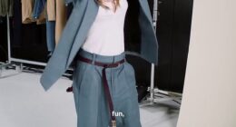 Victoria Beckham looked chic in a slouchy suit a she danced on the set of a photoshoot for her fast-selling GAP range on Tuesday