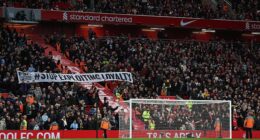Liverpool fans hold up a banner which reads #Stop Exploiting Loyalty as they protest against the rising cost of tickets