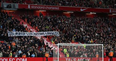 Liverpool fans hold up a banner which reads #Stop Exploiting Loyalty as they protest against the rising cost of tickets