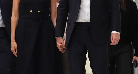 Pictured: Meghan wearing a black Karen Gee dress during a visit to the Royal Children's Hospital in Melbourne