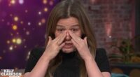 Clarkson wiped away tears during the 1,000th episode of her talk show, and made a cryptic comment that she had 'lost a lot'