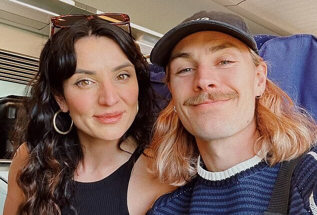 Socceroos player Jackson Irvine (pictured with wife Jemilla Pir) has taken aim at FIFA for its decision to hand its inaugural peace prize to US President Donald Trump