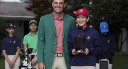 New dad Scottie Scheffler is pictured in his green jacket at Augusta National on Sunday