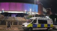 Police vans were parked outside the arena tonight as a search was carried out, following the discovery of a 'suspicious bag'
