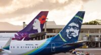 Alaska Airlines bans staff from recently acquired Hawaiian company from wearing leis and aloha shirts on certain routes, report says
