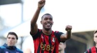 Matchwinner Rayan celebrates with the Bournemouth fans at the end of the 1-0 win at Fulham