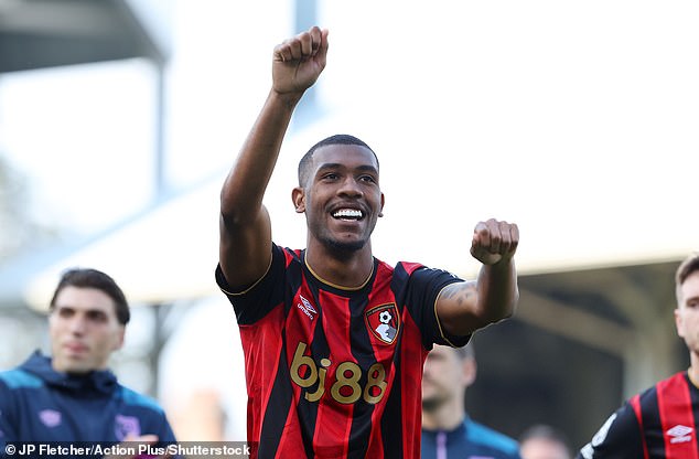 Matchwinner Rayan celebrates with the Bournemouth fans at the end of the 1-0 win at Fulham