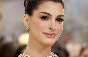 Anne Hathaway has finally addressed speculation that she's had a facelift after baffling fans with her new look (pictured at the Met Gala)