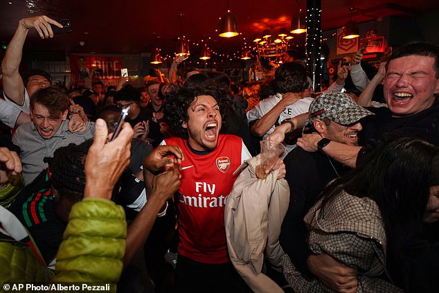 Arsenal fans filled the pubs of north London and celebrated wildly once their title win was confirmed