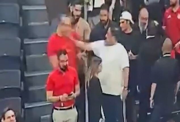 This is the astonishing moment Nottingham Forest owner Evangelos Marinakis allegedly slapped the nephew of Greece¿s Prime Minister during a furious clash at a basketball final in Athens