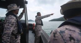 At least 14 missing after boat carrying Indonesian migrants capsizes off Malaysia