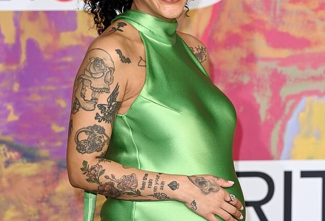 Radio 1 Xtra's Yinka Bokinni, 35, confirmed her pregnancy as she took to the BRITs red carpet at London's O2 Arena on Saturday.