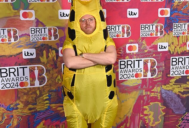 This TV favourite decide to ditch the traditional suit and hit the BRIT Awards 2024 red carpet dressed as a giraffe at London's O2 on Saturday evening