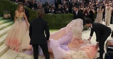 Blake Lively raised eyebrows on Monday's Met Gala red carpet after she appeared to share some stern words with the helpers assisting in lugging around her dress's massive train