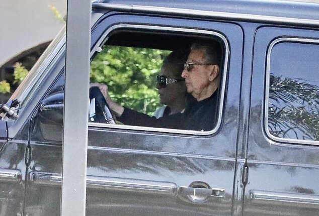 Britney Spears was spotted sitting shotgun of a car on her way back to rehab on Saturday