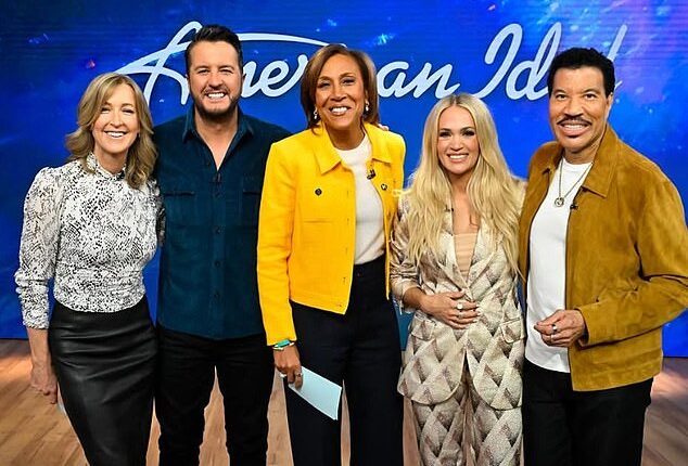 Carrie Underwood (second from right) got ripped by American Idol co-star Lionel Richie (far right) when on Good Morning America on Wednesday with Luke Bryan