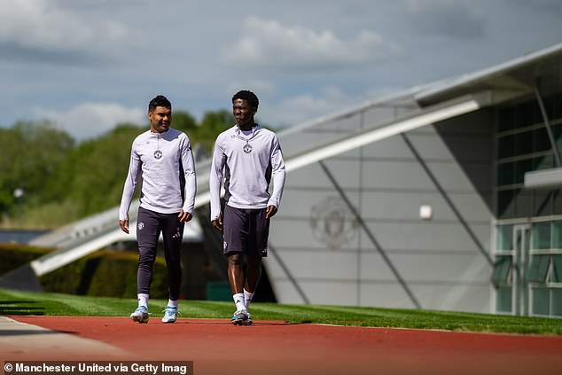 Casemiro (left) has described Kobbie Mainoo (right) as the 'present and the future' of Manchester United