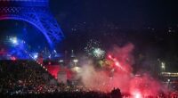 Flares and fireworks were seen close to the Eiffel Tower, which was illuminated in the colours of Paris Saint-Germain following their win over Arsenal