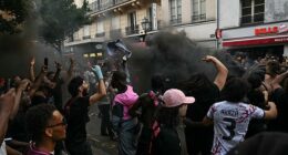 PSG fans caught up in tear gas as they clash with police