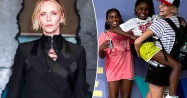 Charlize Theron says her daughters will have to earn jobs and their first car