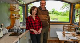 Cecilia Chavez-Brandon and her husband Paul Kirwan have created a train lover's paradise after spending over £50,000 transforming an abandoned 19th century railway station into a cosy retreat