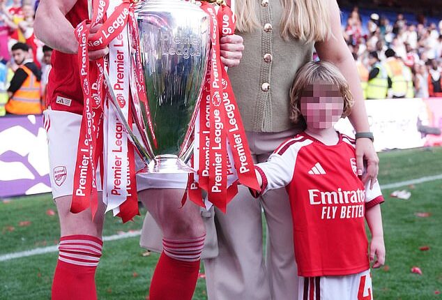 Declan Rice's partner Lauren Fryer makes rare public appearance with him in stunning family photos to celebrate winning the Premier League title with Arsenal