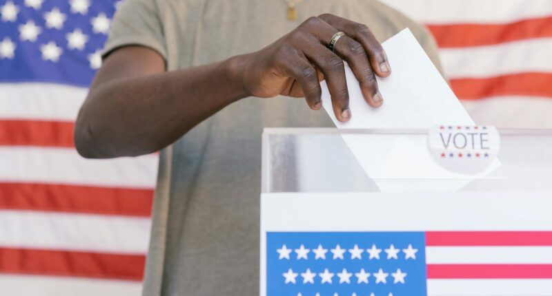 Man votes.