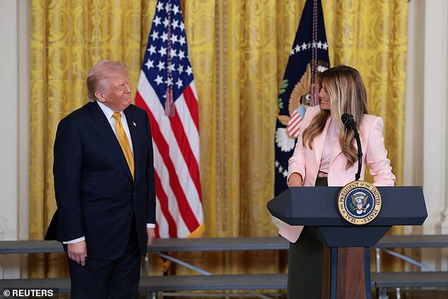 Donald Trump woos military mothers with shiny grin next to 'incredible mom' Melania during Mother's Day tribute