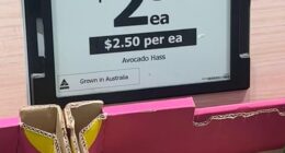 An observant Woolies shopper noticed a small flashing light above the price tag of avocados in their local store