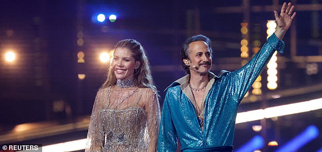 Hosts Victoria Swarovski and Michael Ostrowski on stage during the second semi-final of the 2026 Eurovision Song Contest, in Vienna, Austria, May 14, 2026. REUTERS/Lisa Leutnerâ¿¨