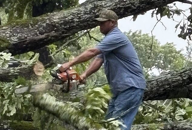 Families trapped in wreckage and rising floods as tornadoes rip through Mississippi, tearing roofs from homes and destroying entire structures