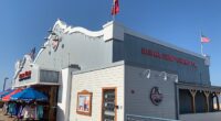 A slice of Hollywood nostalgia is heading Down Under and it's already dividing fans (picture of a Bubba Gump restaurant on Santa Monica Pier)