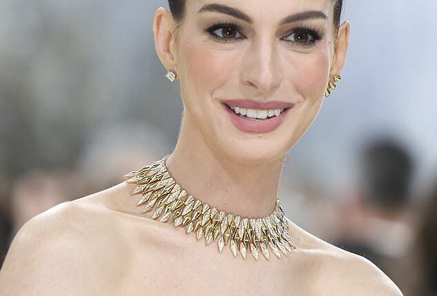 Anne Hathaway at Monday's Met Gala. The Oscar winner recently put paid to plastic surgery rumours by sharing her secret ‘facelift hair hack’