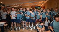 Arsenal's players watch Manchester City drop points on Tuesday night, handing them the Premier League title