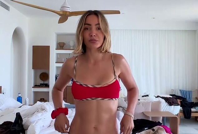 Frankie Bridge has defiantly posed in a skimpy red bikini as she hit back at mum-shamers who trolled her for going on holiday without her children