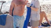 On Monday afternoon Angela Rayner, 46, caused fellow revelers to do a double take when she was spotted soaking up the sunshine on packed Brighton beach with her boyfriend