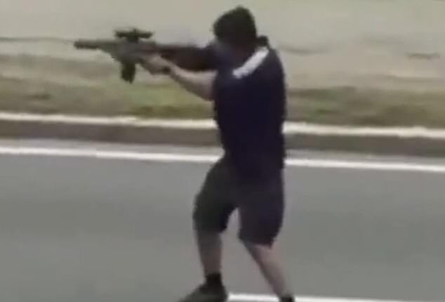 The suspect was caught on video waving the gun erratically in the street after letting off dozen of shots