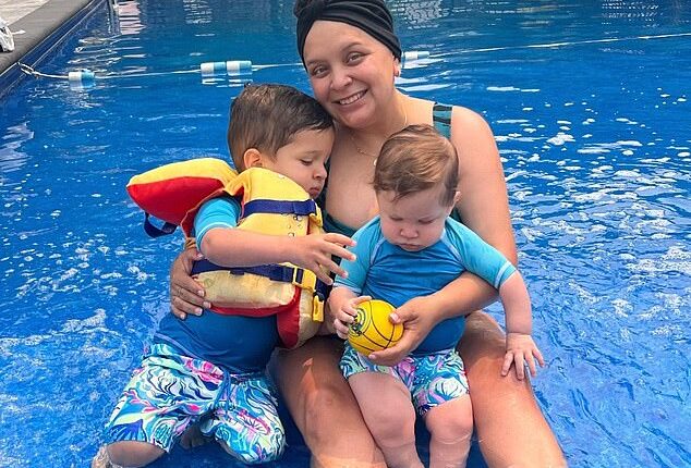 Melissa Reyes and her two children in a swimming pool. She was diagnosed with breast cancer at just 36 years old, shortly after welcoming her second child