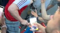 An Arsenal fan was mobbed and roughed up by PSG supporters in Paris in harrowing scenes